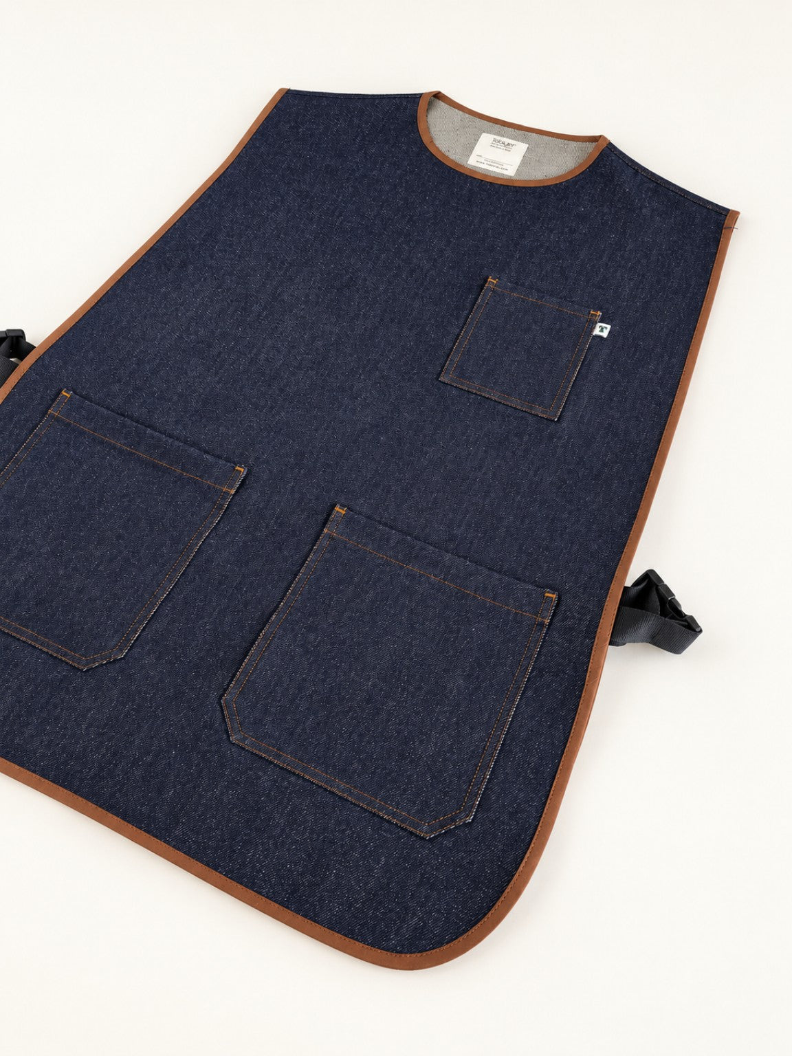 Casulla Pittsburgh Denim con bolsillos y ribetes marrones