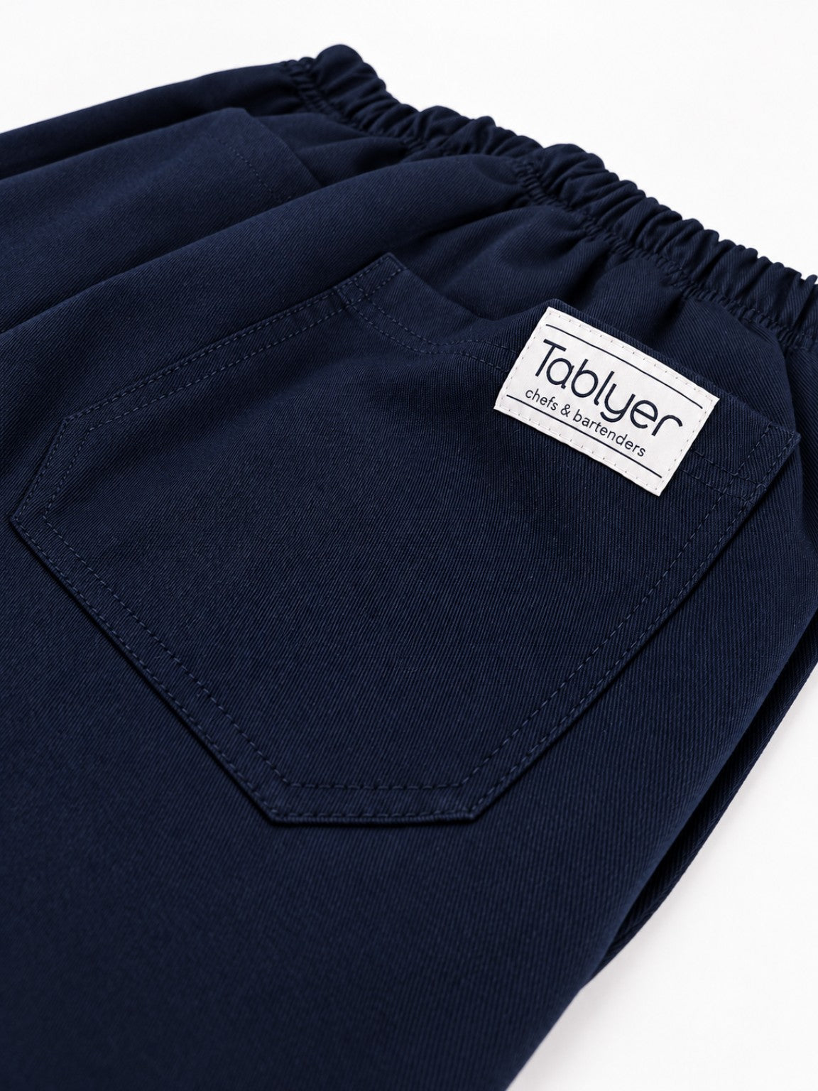 Pantalón Worker Blue detalle de bolsillo trasero y etiqueta Tablyer