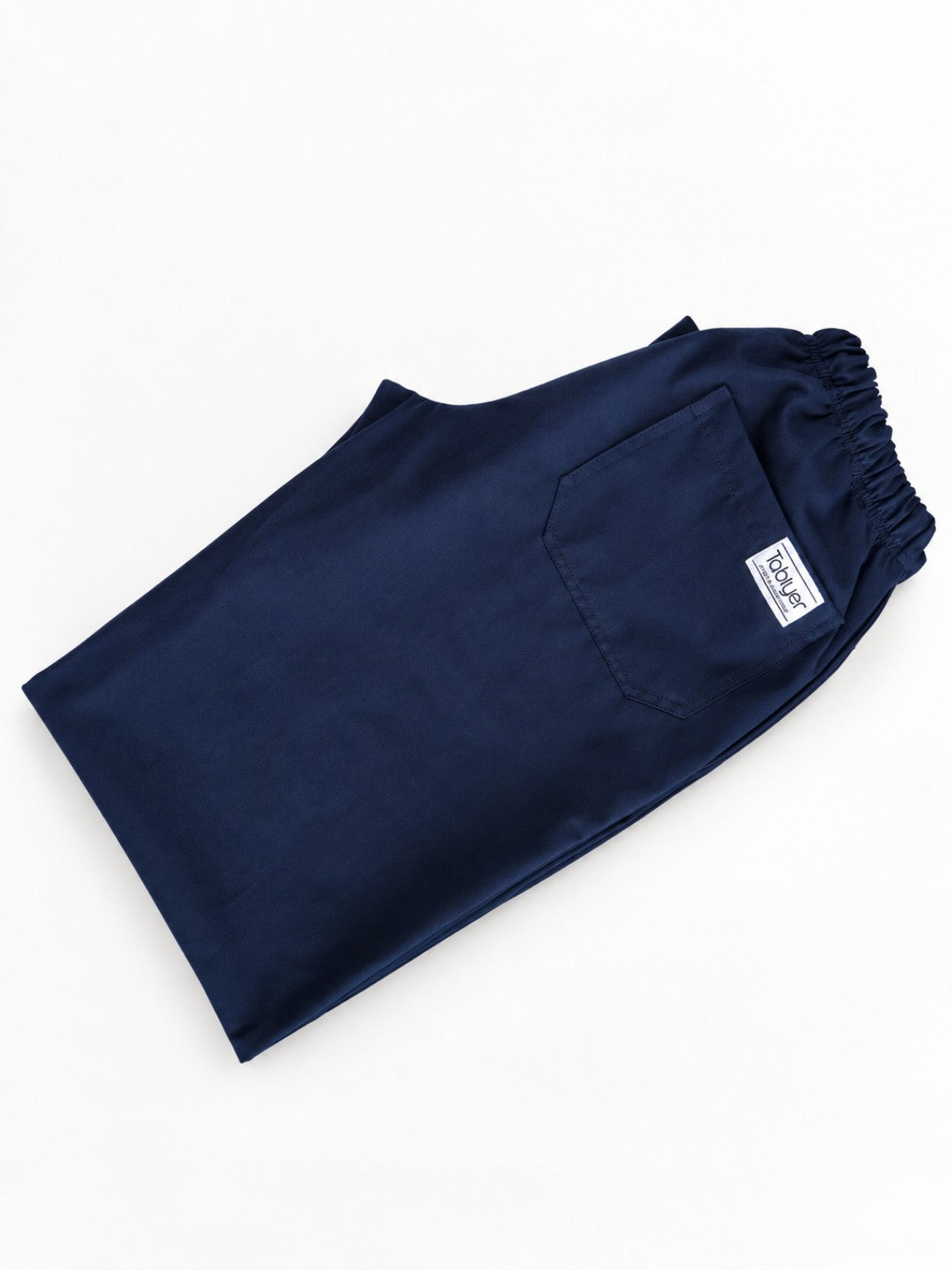 Pantalón Worker Blue doblado con bolsillo trasero y etiqueta Tablyer